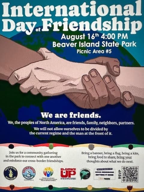 Poster for International Day of Friendship event on August 16 at Beaver Island State Park, featuring two hands shaking and event details, with a message about friendship and unity.