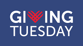Giving Tuesday logo with the word 'Giving' in white text; the 'V' is styled as a red heart, on a blue background. 'Tuesday' is written below in white.